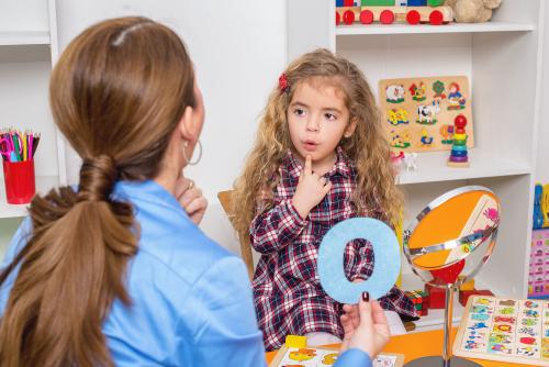 A girl learning pronunciation