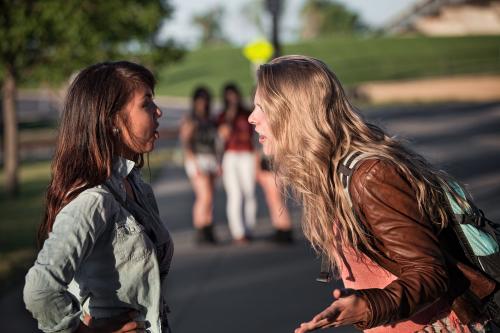 Two teenagers fighting