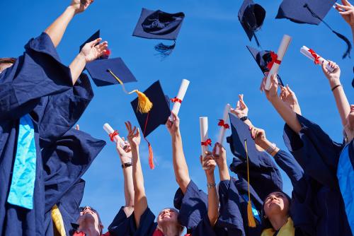 Cheering graduates