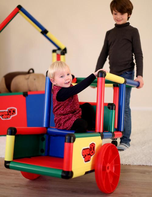 Children playing with QUADRO vehicle